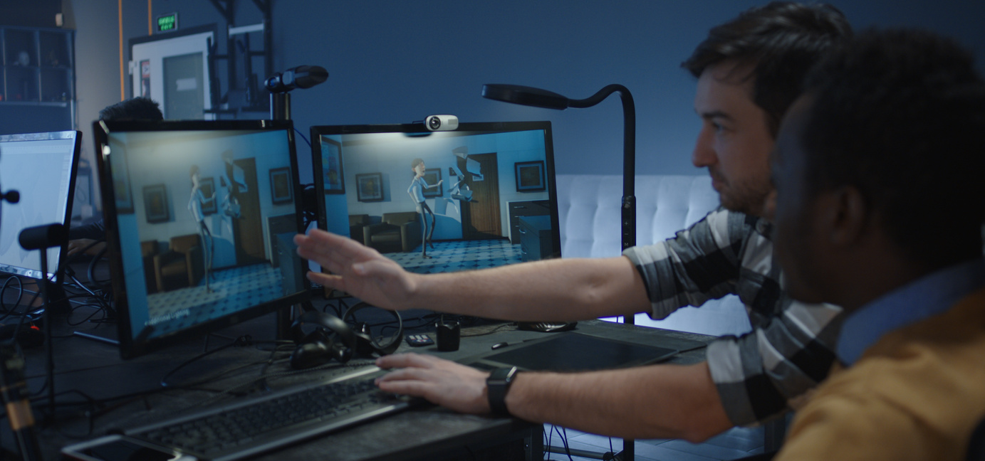 Digital artists discussing an animated film